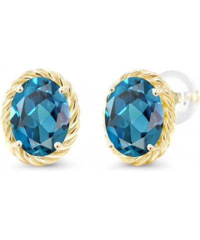 14K Yellow Gold London Blue Topaz Stud Earrings For Women (2.60 Cttw, Gemstone Birthstone Oval 8X6MM) $91.80 Earrings