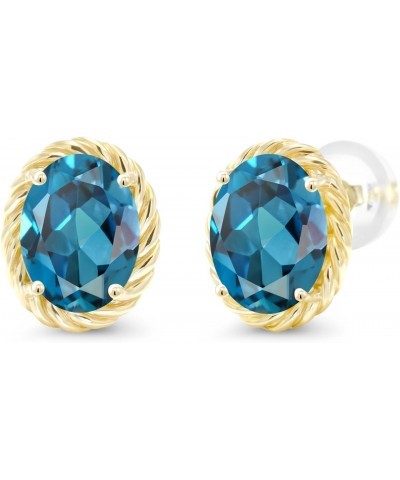 14K Yellow Gold London Blue Topaz Stud Earrings For Women (2.60 Cttw, Gemstone Birthstone Oval 8X6MM) $91.80 Earrings