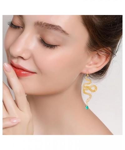 The Golden Snake Earrings, Hypoallergenic Wanderlust Jewelry Witchy Earrings gold $9.38 Earrings